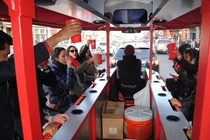 a group of people sitting at a train station