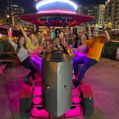 a group of people sitting at night