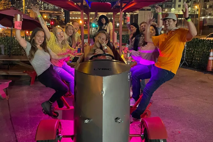 a group of people sitting at night