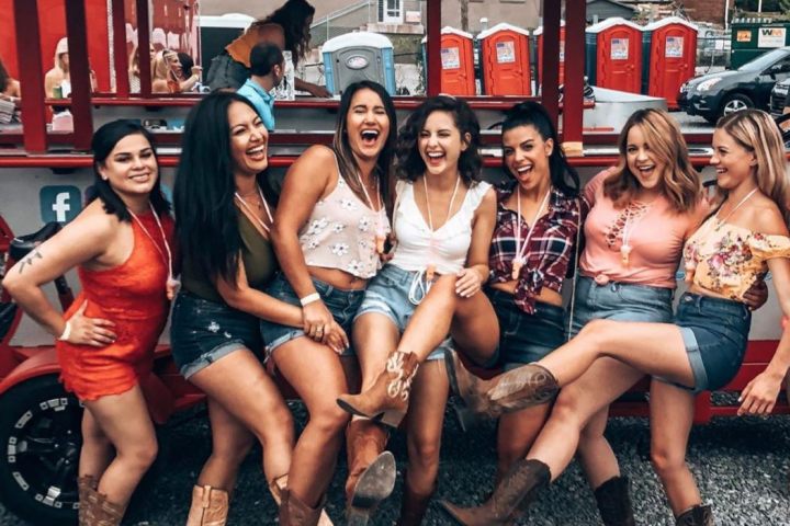 a group of people sitting posing for the camera